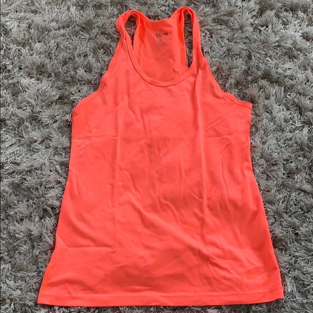 Bright peach Nike dri-fit racerbank tank.